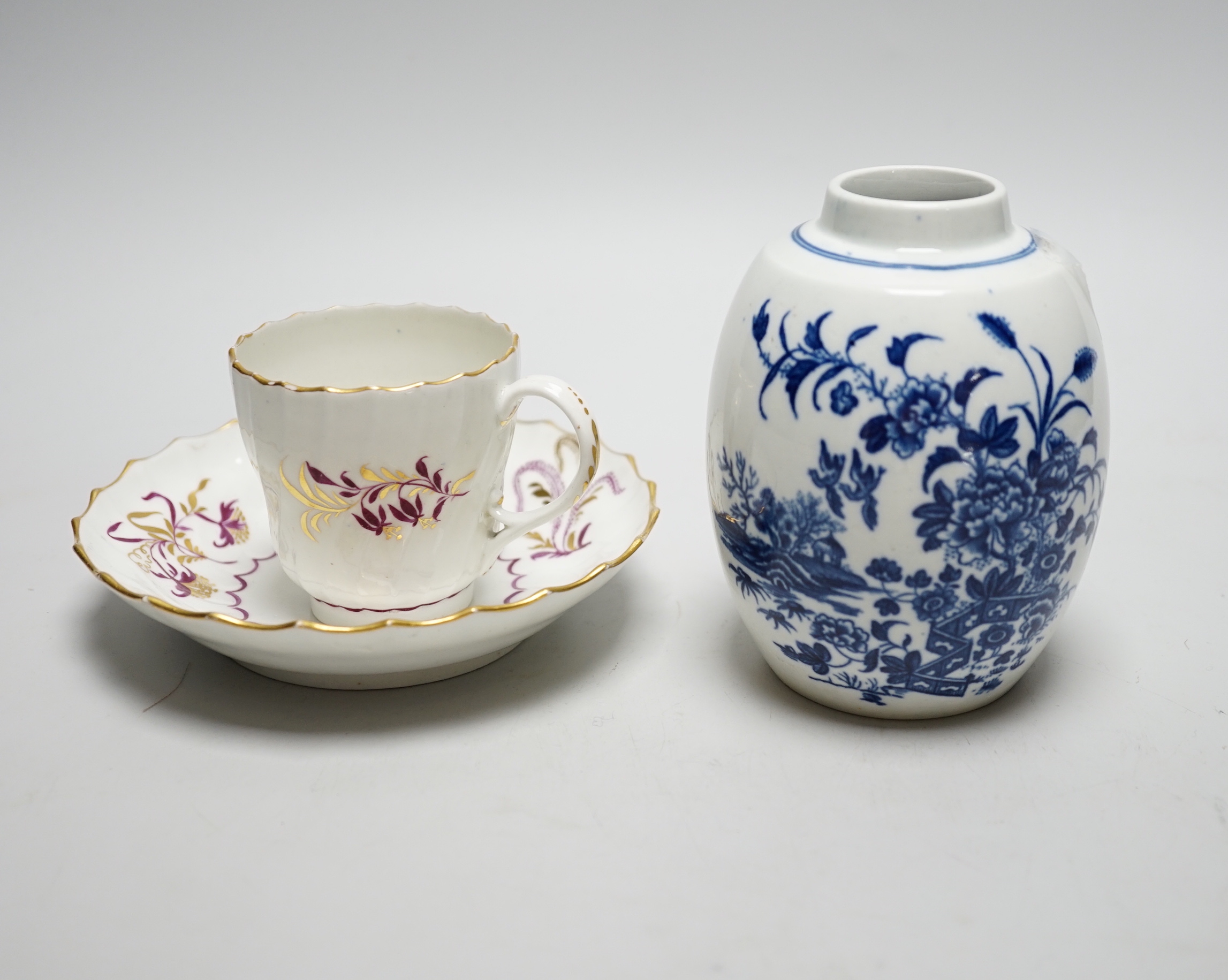 A Worcester Fence pattern tea canister, c.1775, and a Worcester wrythen coffee cup and saucer, c.1795